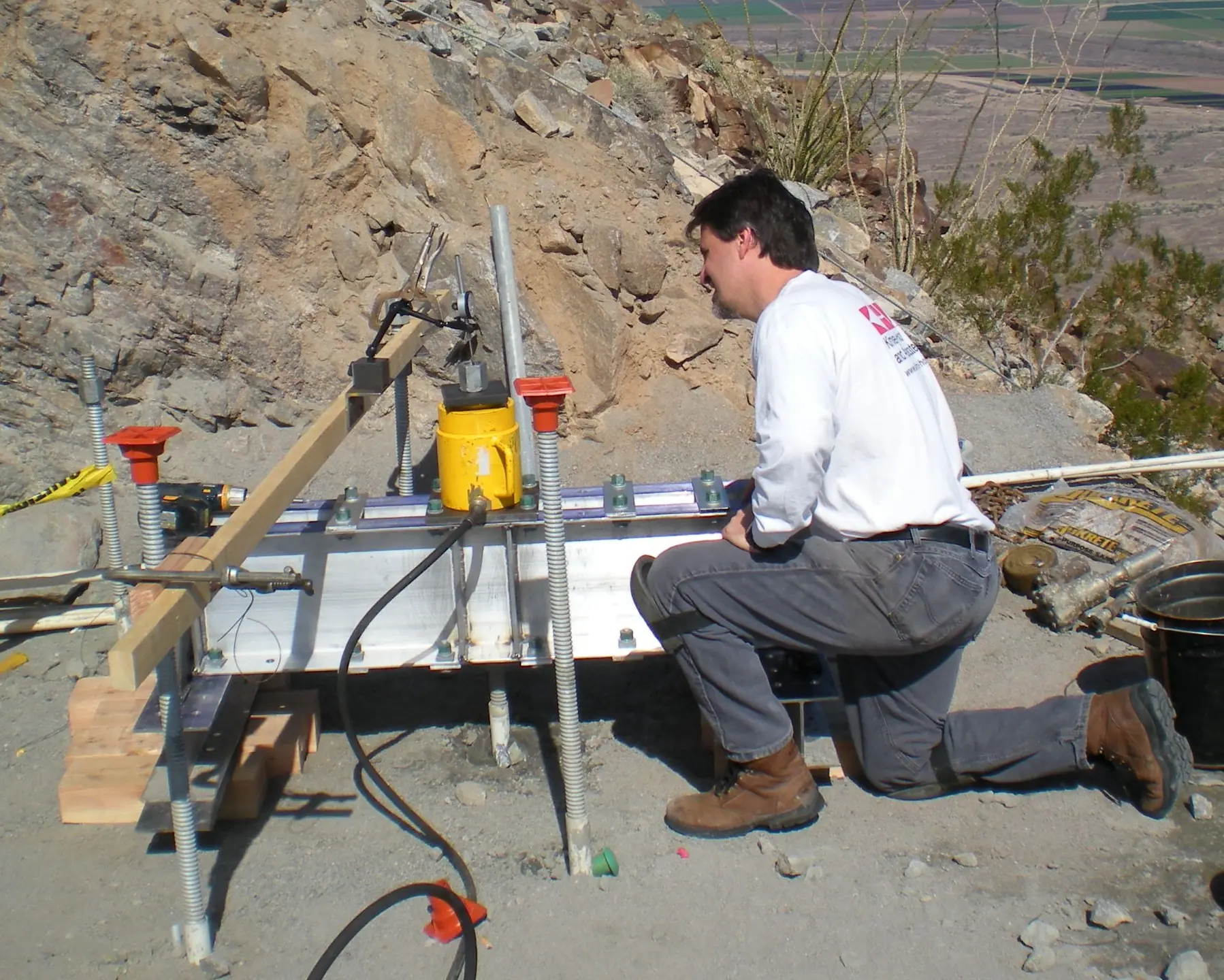 Load test frame for rock anchors — a lightweight aluminum frame for a remote site.