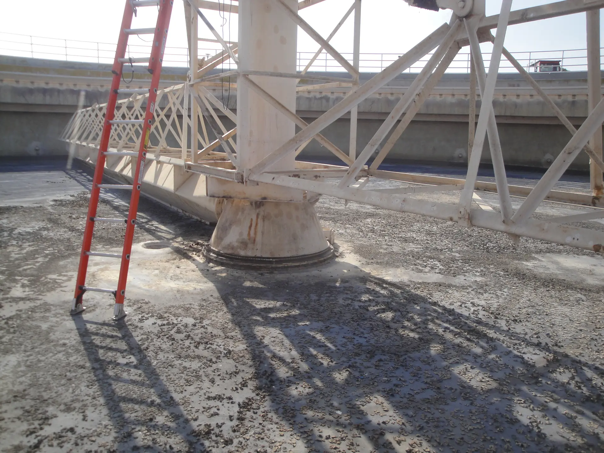 Wastewater clarifier concrete tank and steel rake and scraper — evaluation and seismic retrofit.